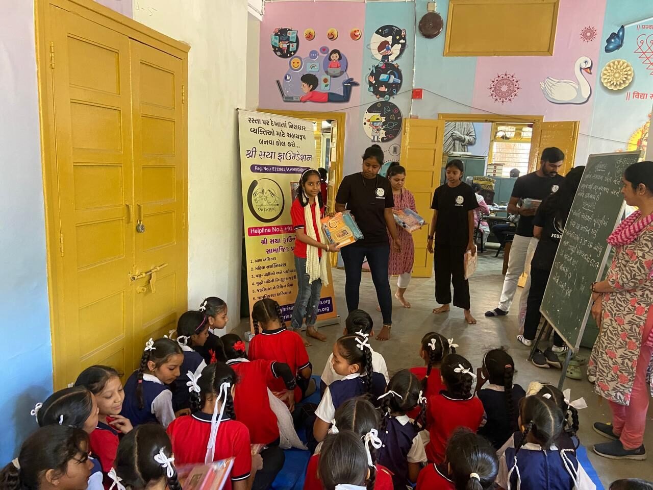 Shree Sneh Foundation team with children at a rural education center